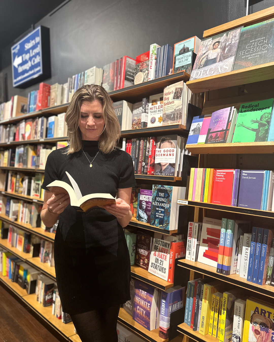 Image of Alice reading a book