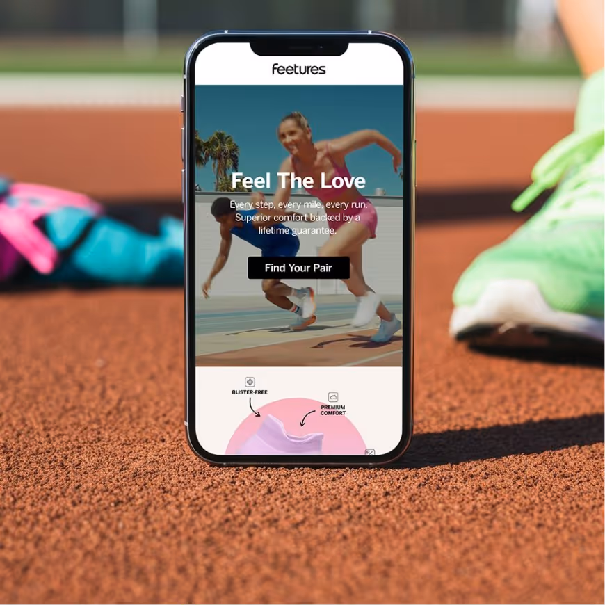 Smartphone on a running track displaying a fitness app with runners and a 'Find Your Pair' button.