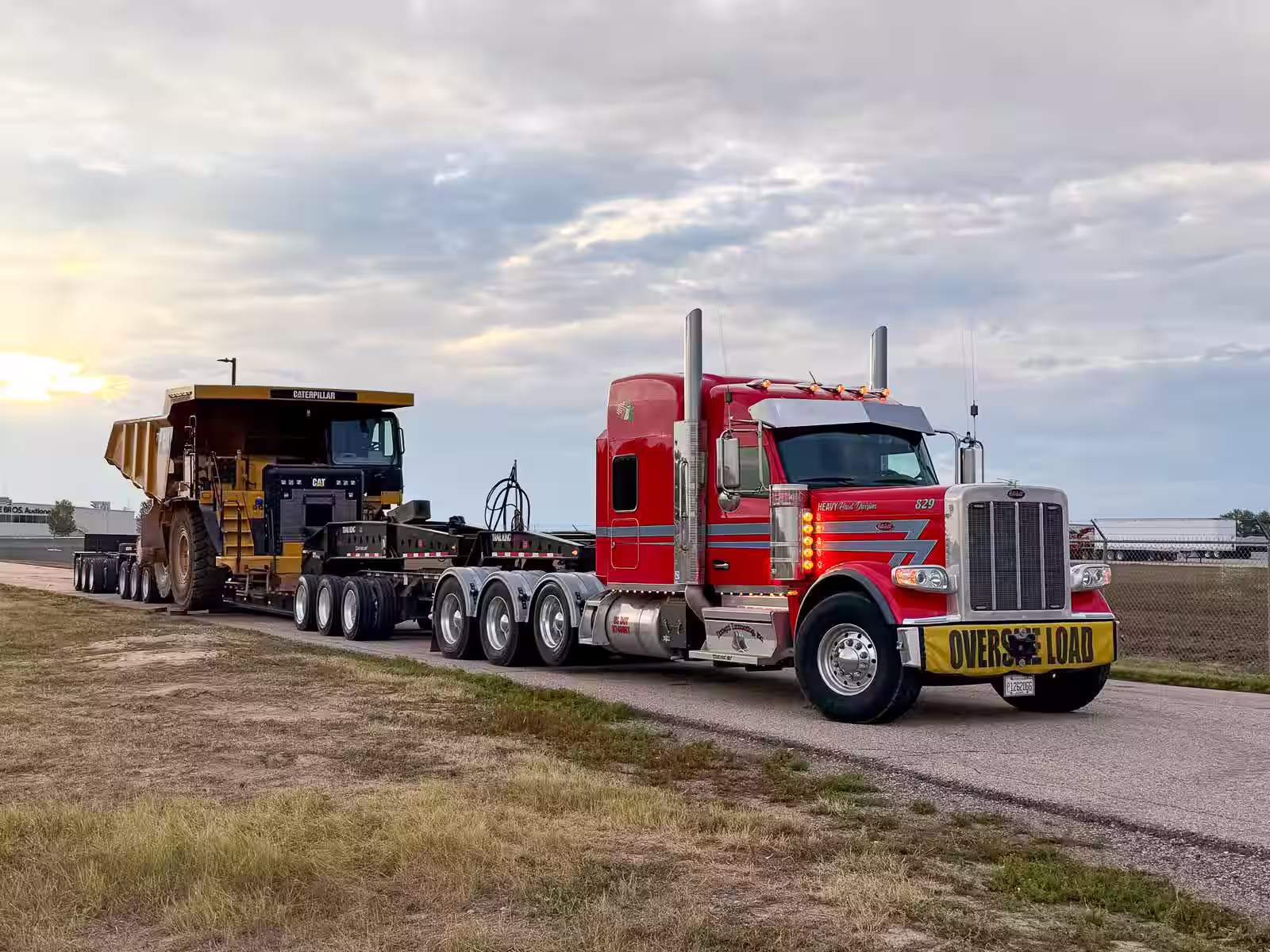 Donegal oversize load truck hauling a large CAT mining truck in Northern Illinois.