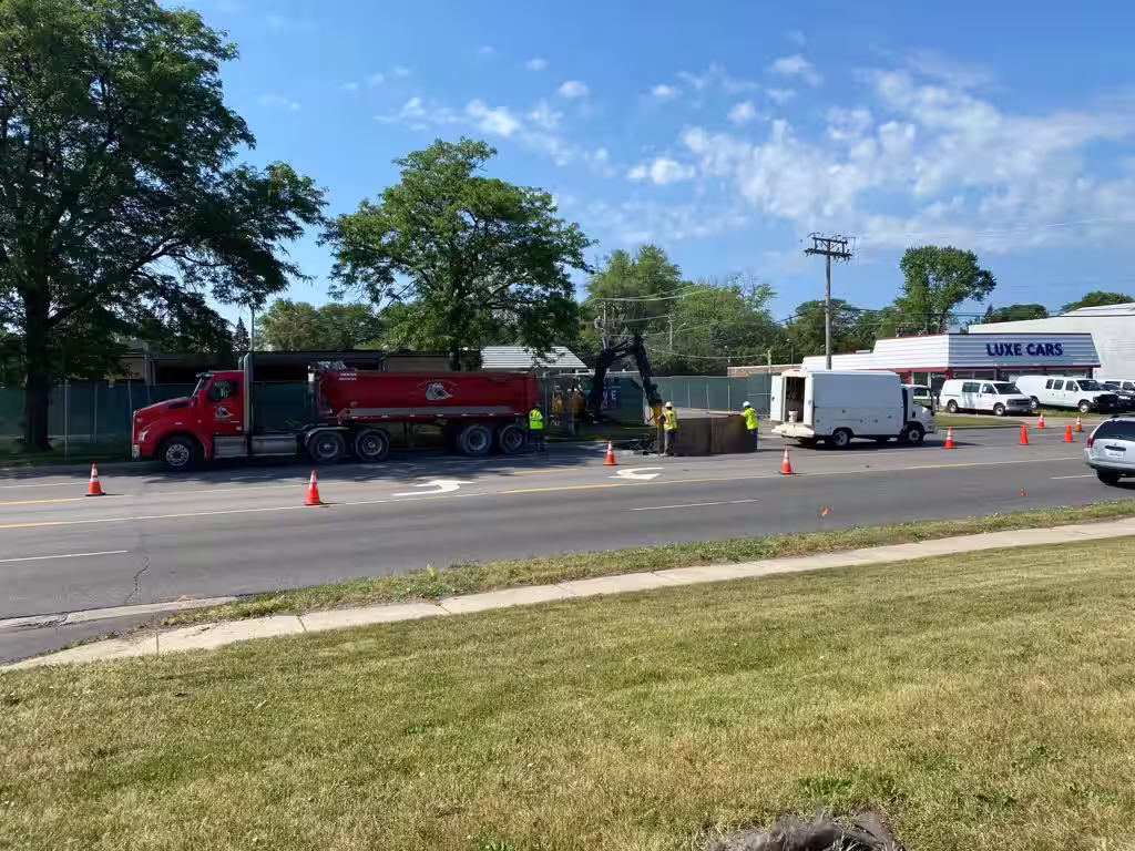 Commercial sewer and water installation by Donegal Services, including underground utilities and heavy equipment trenching.