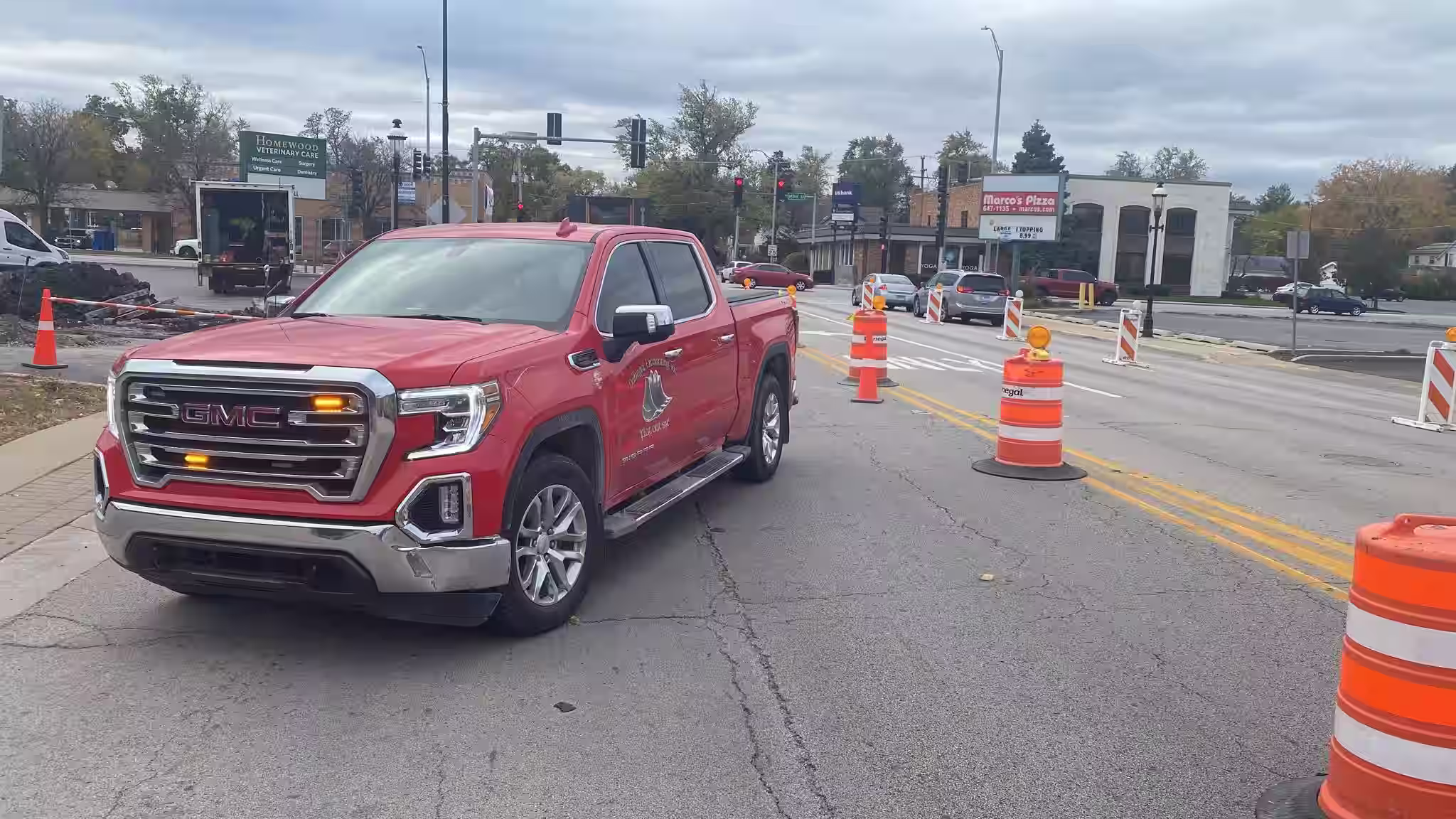 Donegal traffic control truck directing vehicles around an active construction zone in Chicagoland.