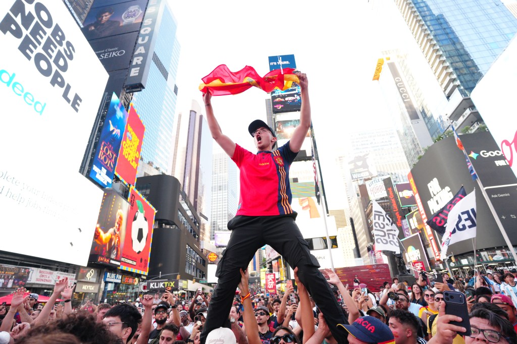 Fans react after Spain defeated Argentina in the FIFA World Cup final, 1-0, in Times Square on Sunday, July 19, 2026, in New York. (James Keivom for the New York Post)