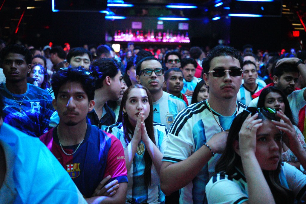 Argentina fans gather at Nebula Nightclub in New York City to watch the FIFA World Cup final.