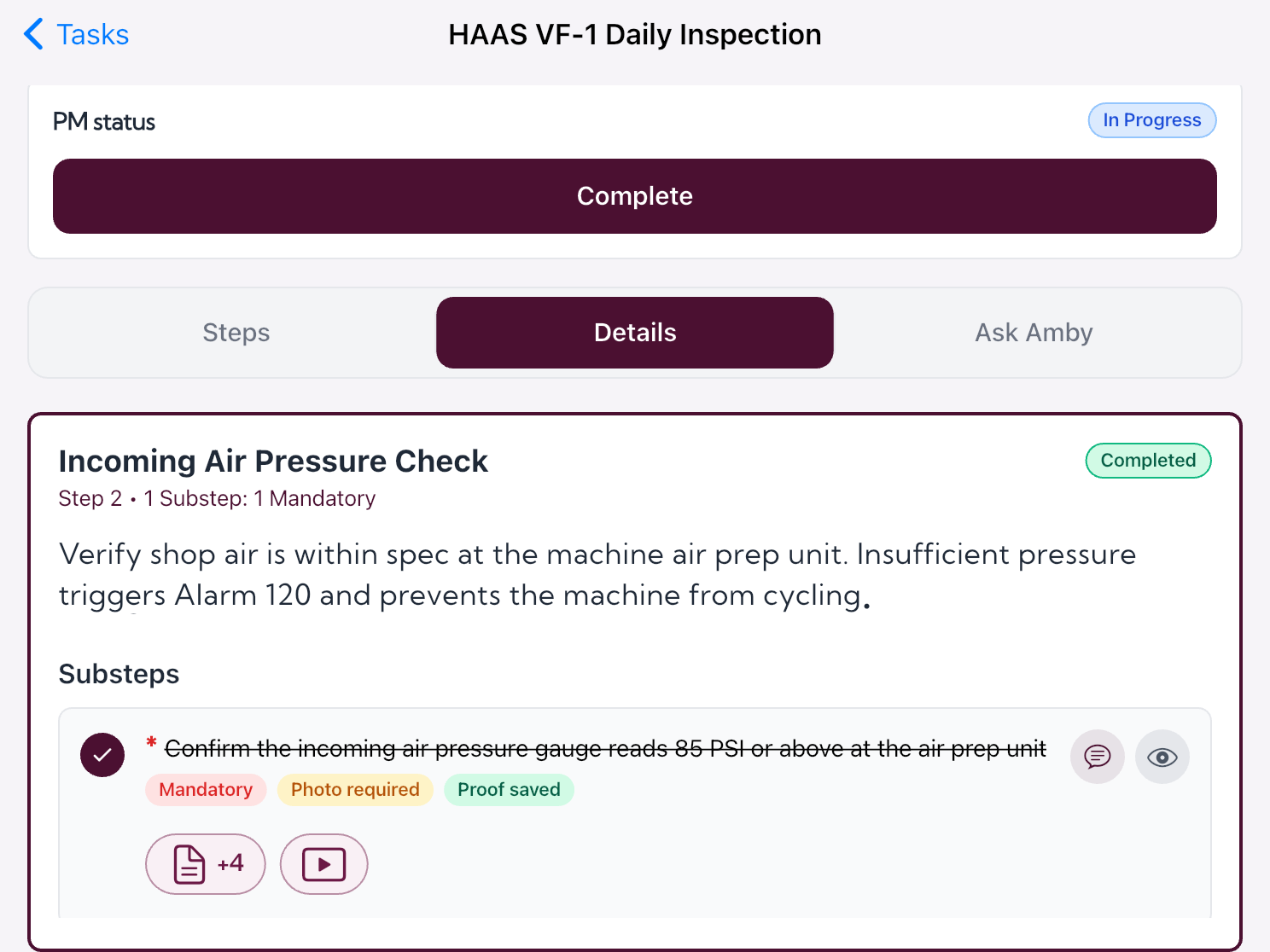 A daily inspection step in Amby showing mandatory photo evidence and proof saved
