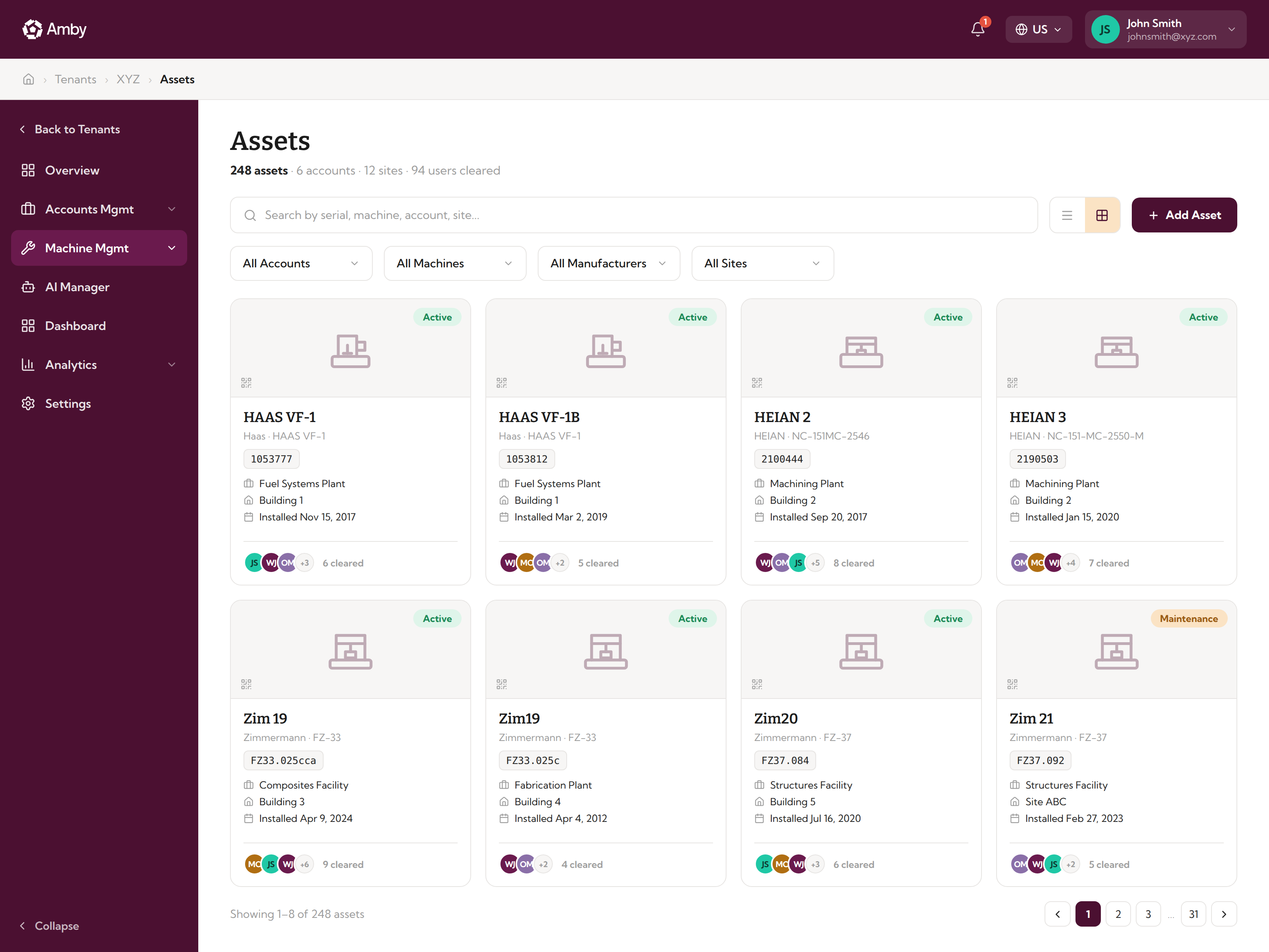 The Amby Assets page listing machines across multiple accounts and sites with manufacturer and install details