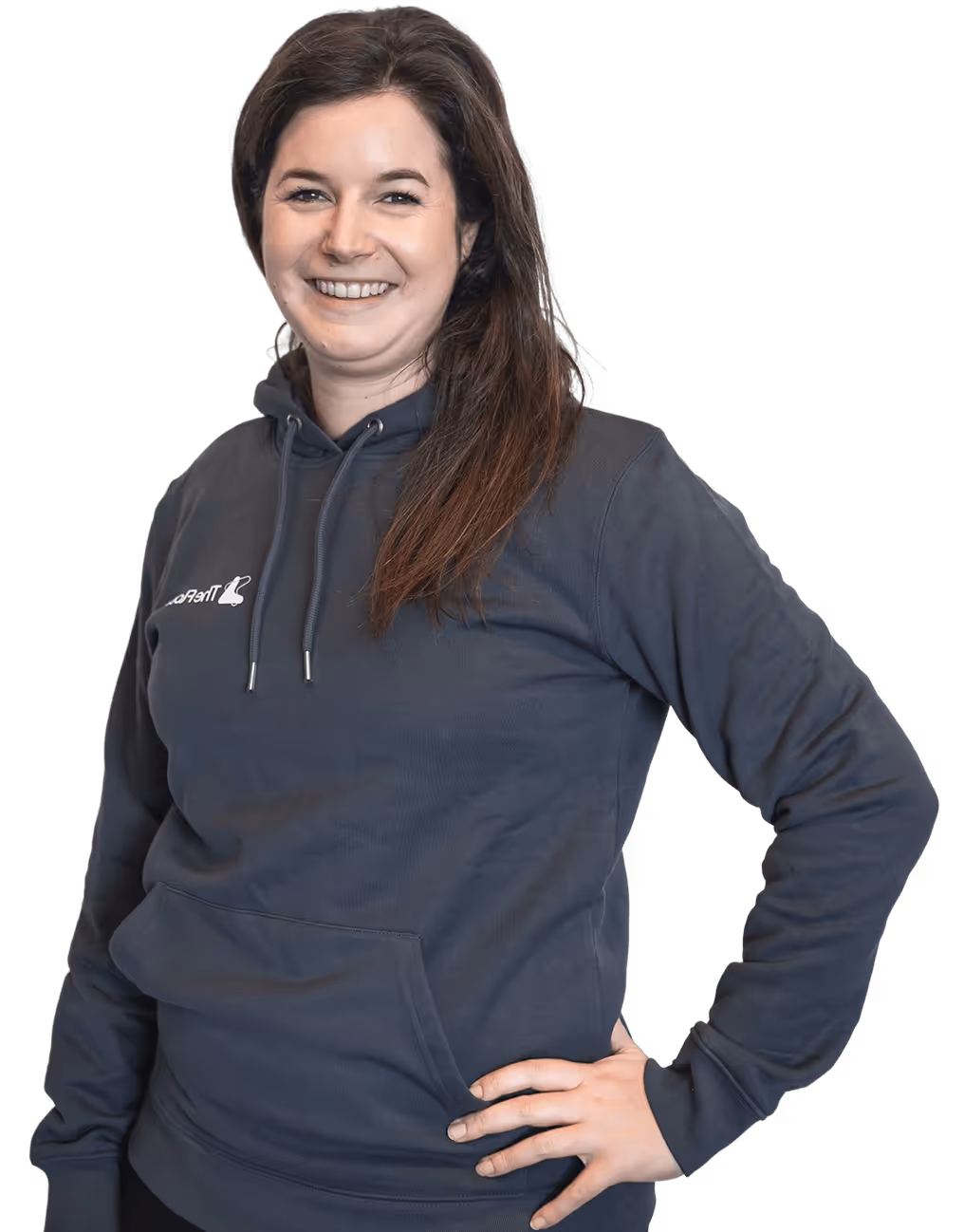 A professional portrait of a team member wearing branded apparel against a dark background, reflecting confidence, approachability, and company identity.