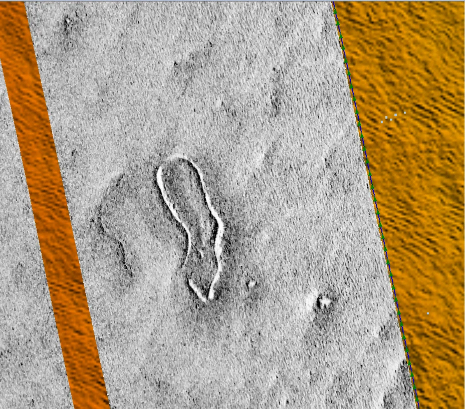 A high-resolution side-scan sonar (SSS) acoustic image displaying an underwater target with a distinct acoustic shadow on the seabed for marine debris detection.