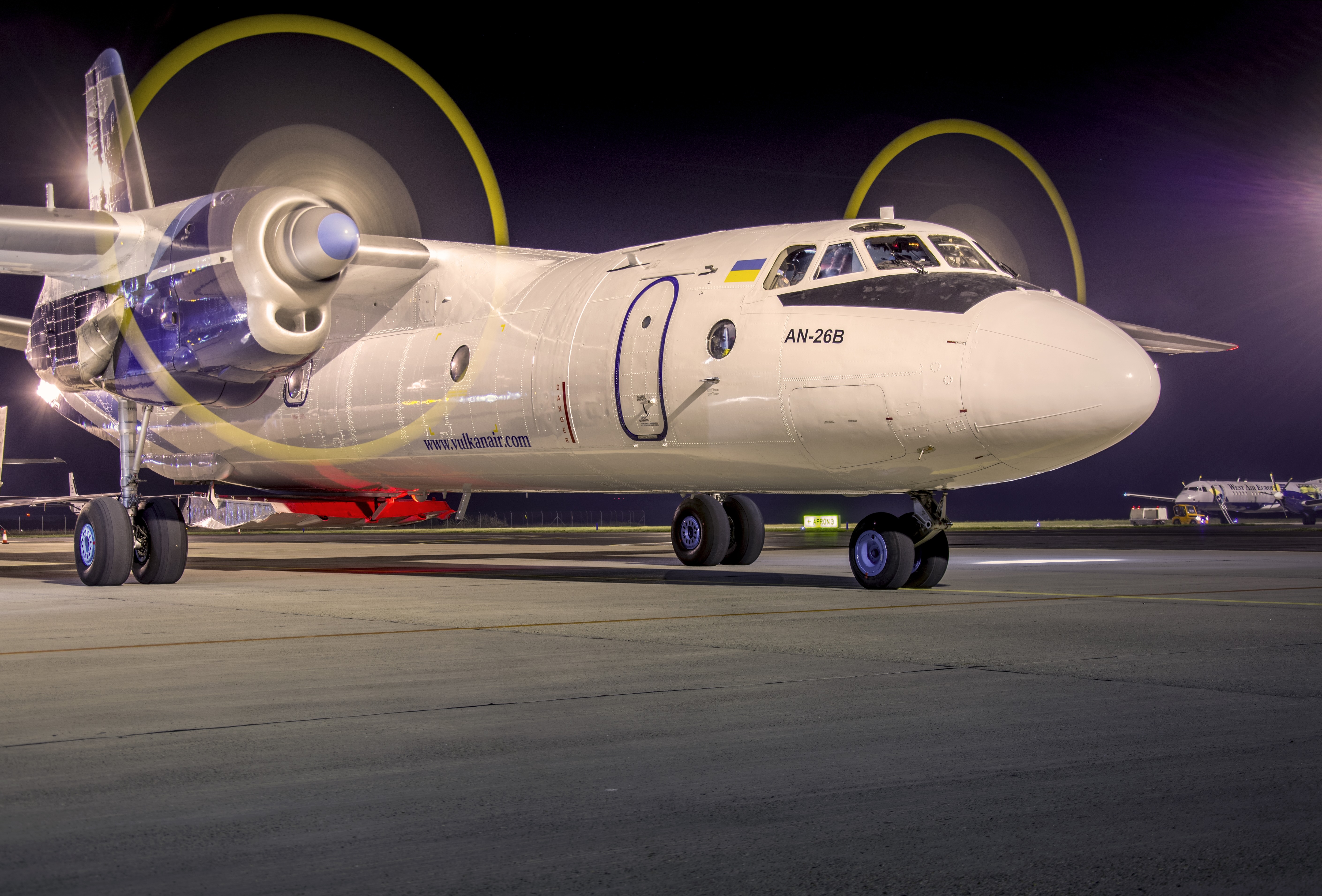 [background image] airport runway and terminal view for an aviation service.