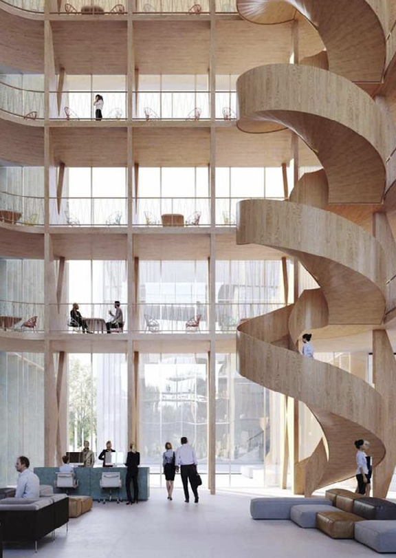 Åpen kontorlobby med høyt tak, store vinduer, moderne møbler og en stor spiraltrapp i tre.