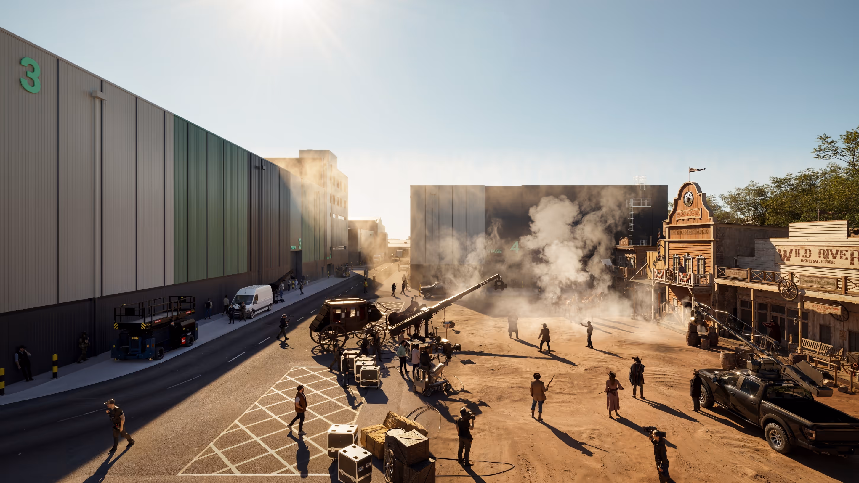 Film crew shooting a western movie scene on a dusty set with old western buildings, smoke effects, and camera equipment on cranes.