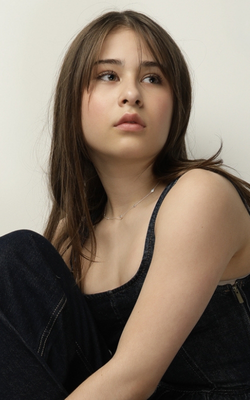 Seraphine Krystek Portfolio picture wearing white shirt.