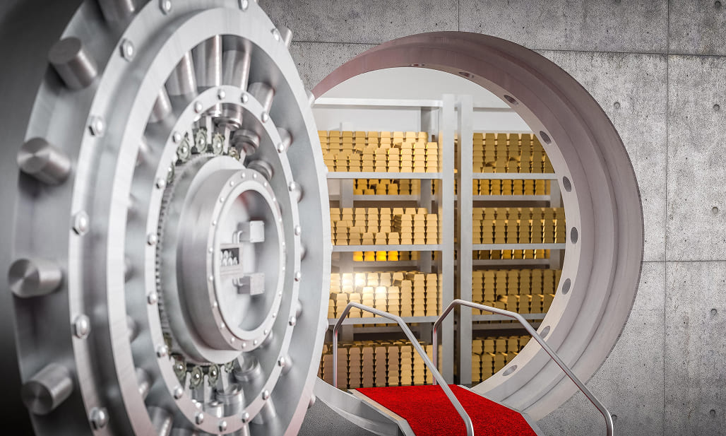 A massive vault door open, revealing shelves stacked with gold bars
