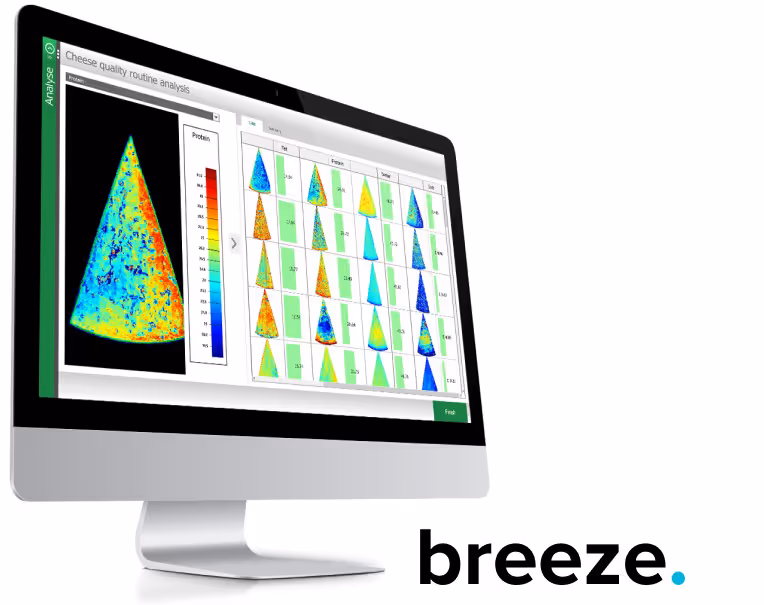 Computer screen displaying cheese quality routine analysis with color-coded protein distribution maps, next to the word 'breeze' in black text with a blue dot.