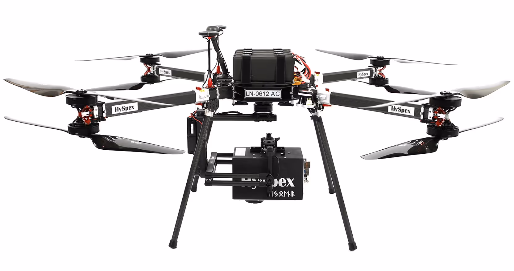 Professional quadcopter drone with black carbon fiber frame and propellers, equipped with a camera and various sensors.