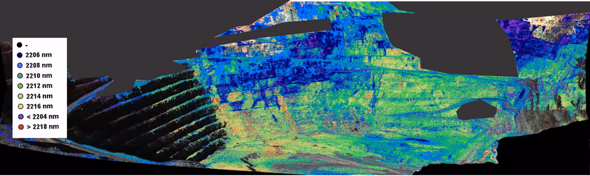 Color-coded spectral map of a geological sample showing variations in wavelengths from 2206 nm to above 2218 nm with a legend.