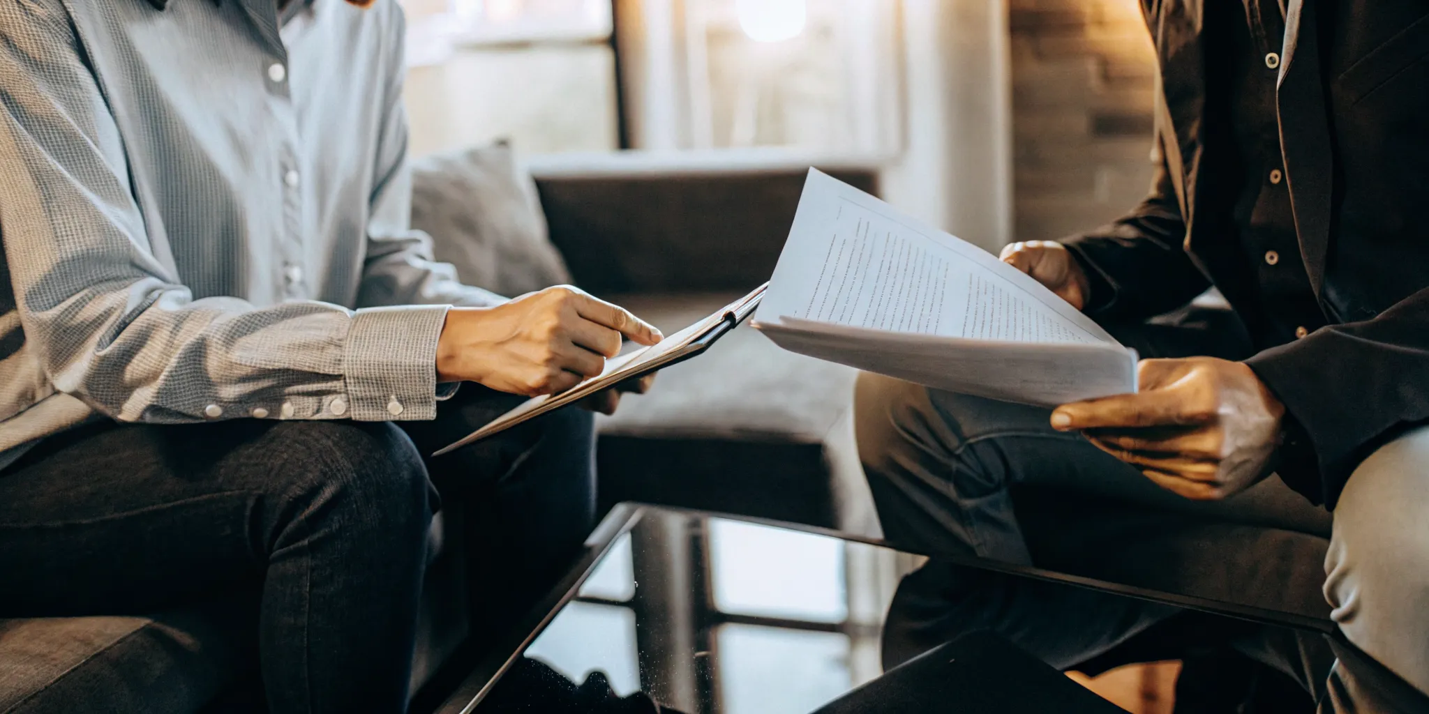 Renter discussing rental application fees with a property manager