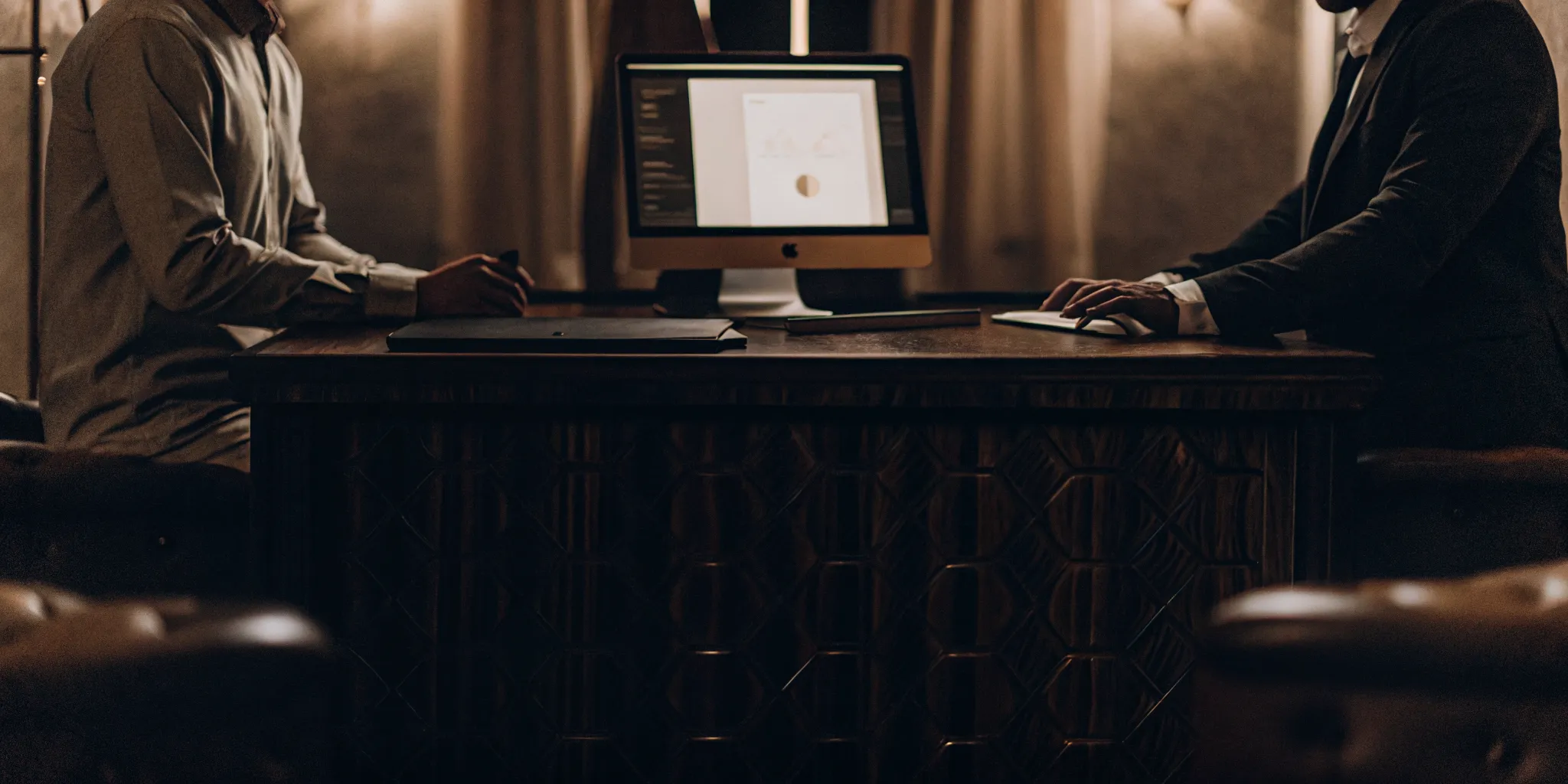 Secure modern office workspace displaying tenant screening and income verification tools
