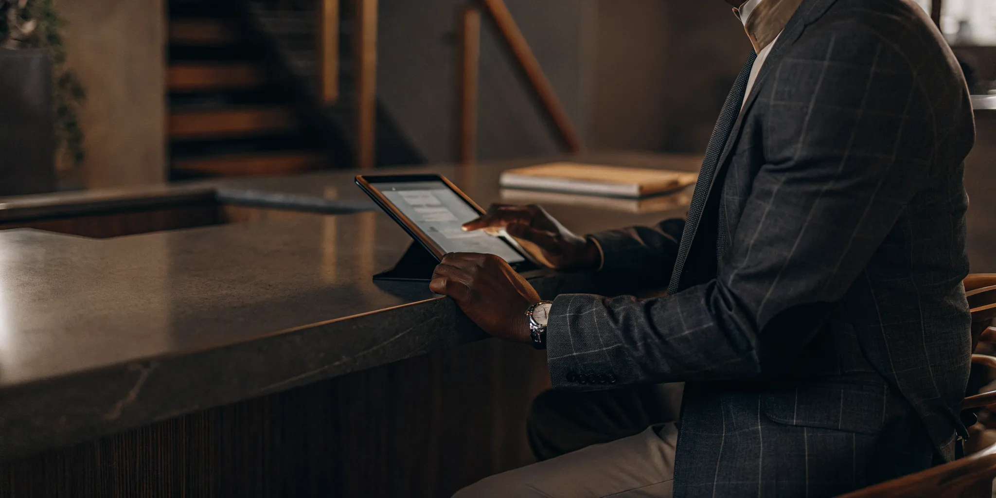 Property manager reviewing lease compliance documents on a tablet screen