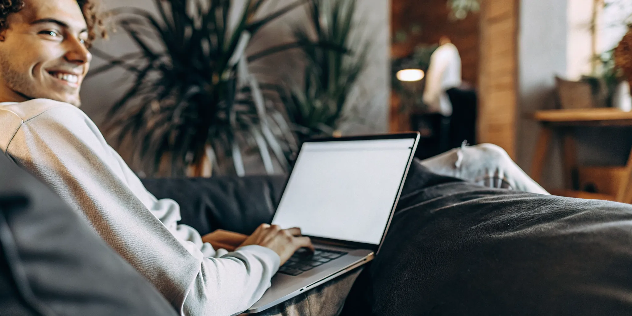 Renter reviewing a tenant screening report on a laptop