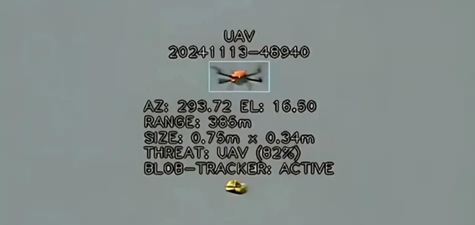 Grey vehicle with mounted EchoShield radars against a black background with grey hexagon pattern