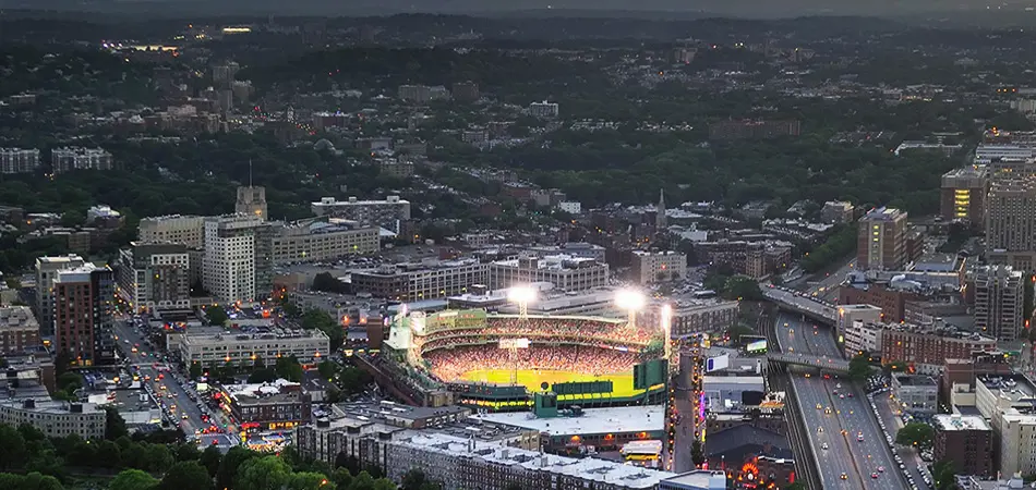 Grey vehicle with mounted EchoShield radars against a black background with grey hexagon pattern