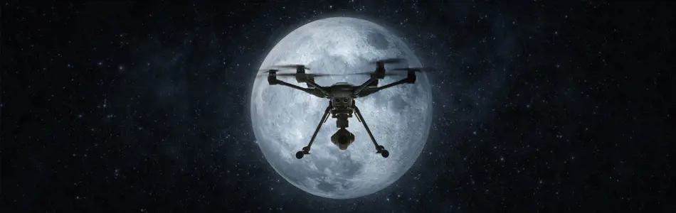 Grey vehicle with mounted EchoShield radars against a black background with grey hexagon pattern