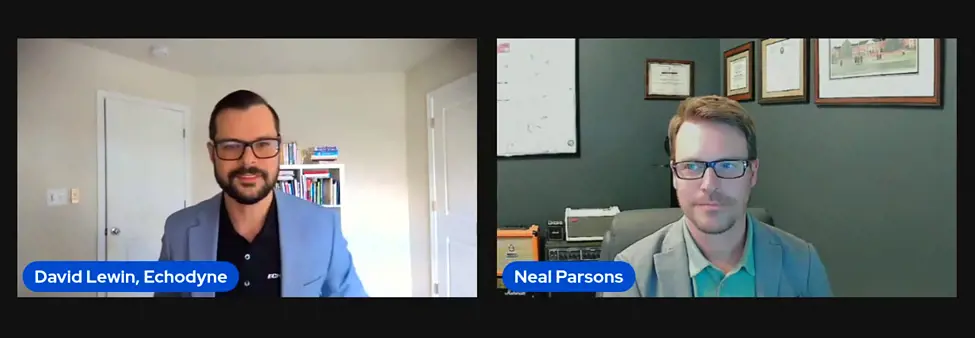 Grey vehicle with mounted EchoShield radars against a black background with grey hexagon pattern