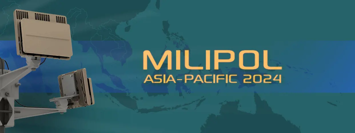 Grey vehicle with mounted EchoShield radars against a black background with grey hexagon pattern