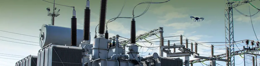 Grey vehicle with mounted EchoShield radars against a black background with grey hexagon pattern