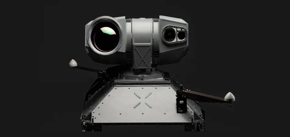 Grey vehicle with mounted EchoShield radars against a black background with grey hexagon pattern