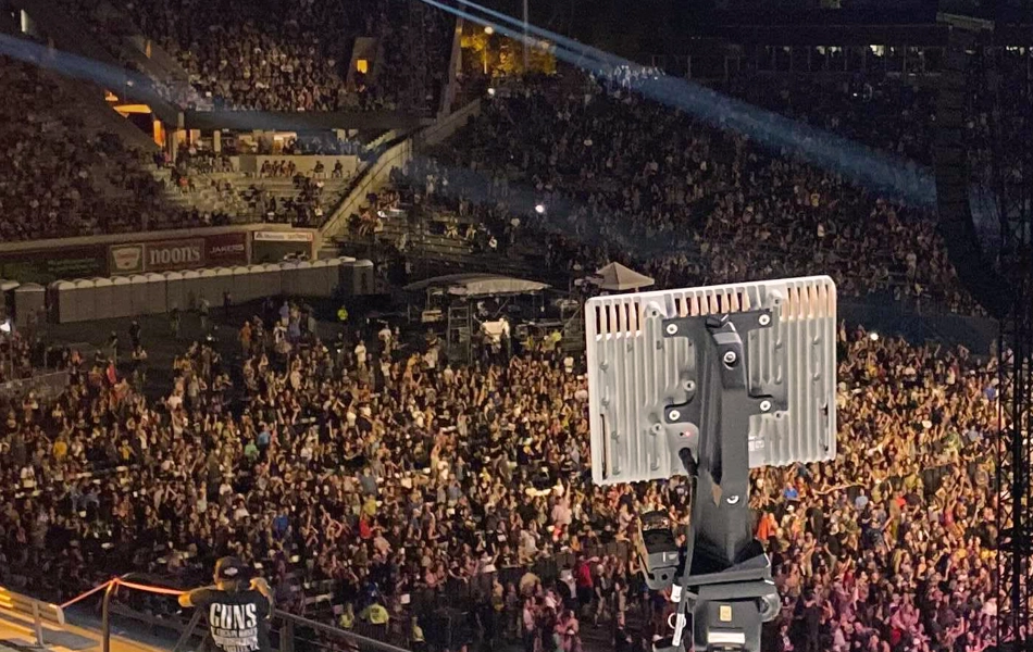 Grey vehicle with mounted EchoShield radars against a black background with grey hexagon pattern