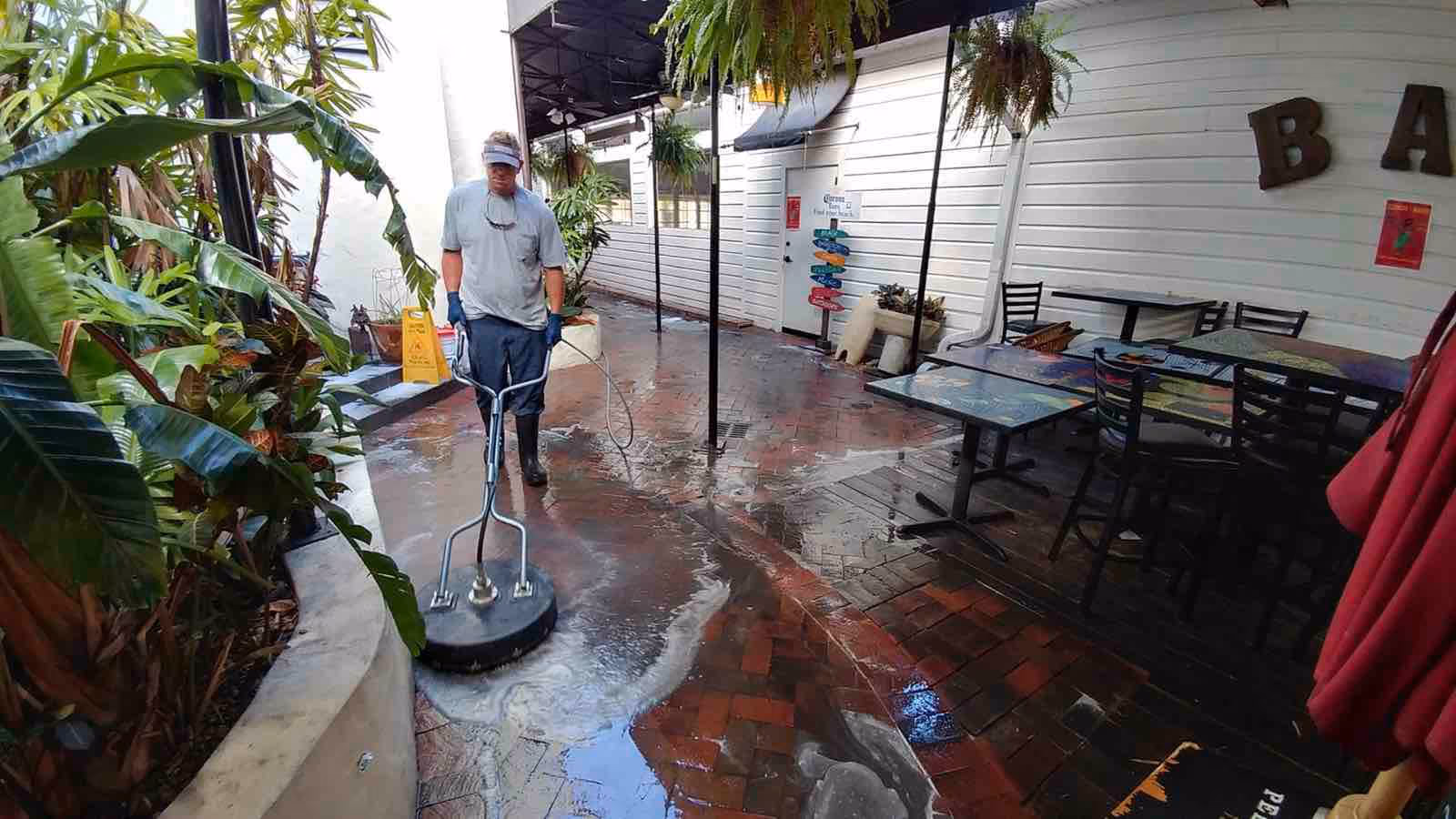 Ragin Cajun Soft Wash commercial pressure washing service cleaning storefront sidewalks and entryways