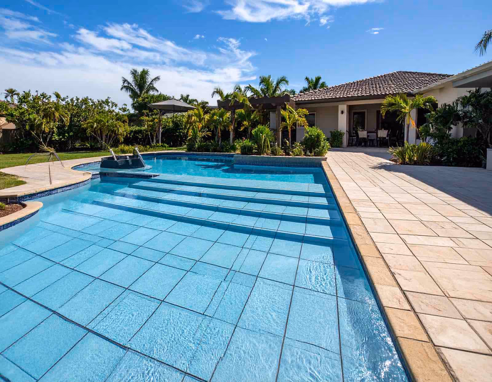 Ragin Cajun Soft Wash pool deck cleaning removing algae and restoring slip-resistant surface