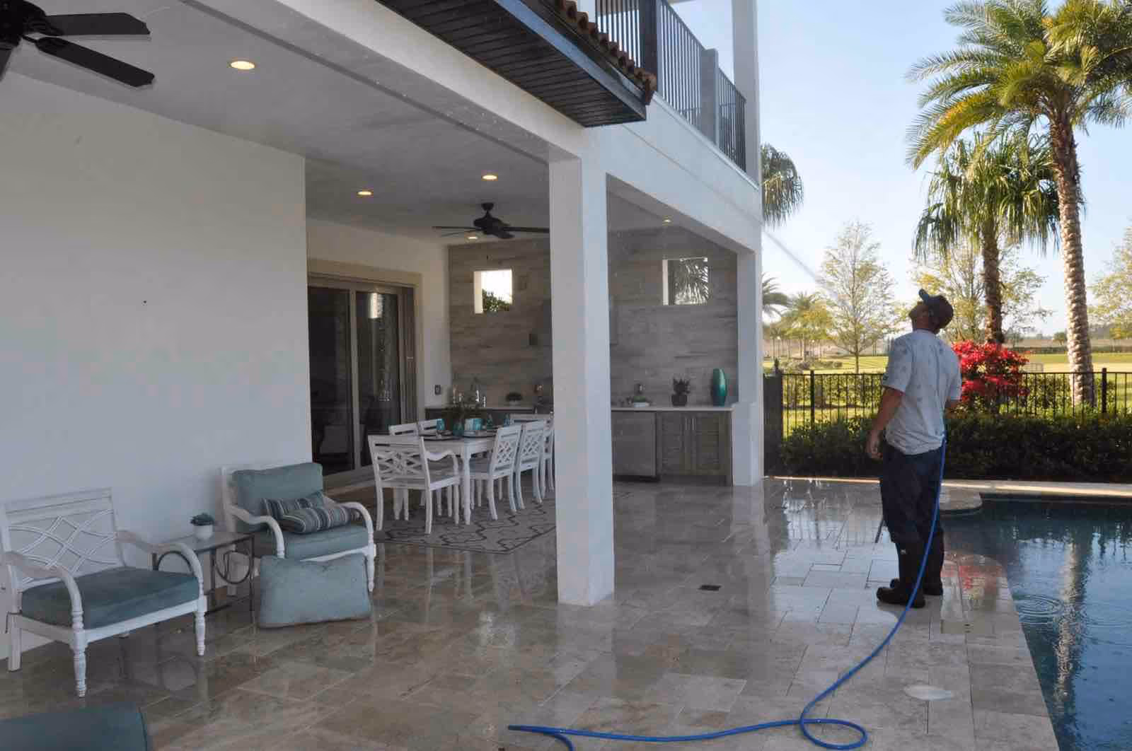 Before and after power washing Longwood by Ragin Cajun Soft Wash restoring property curb appeal