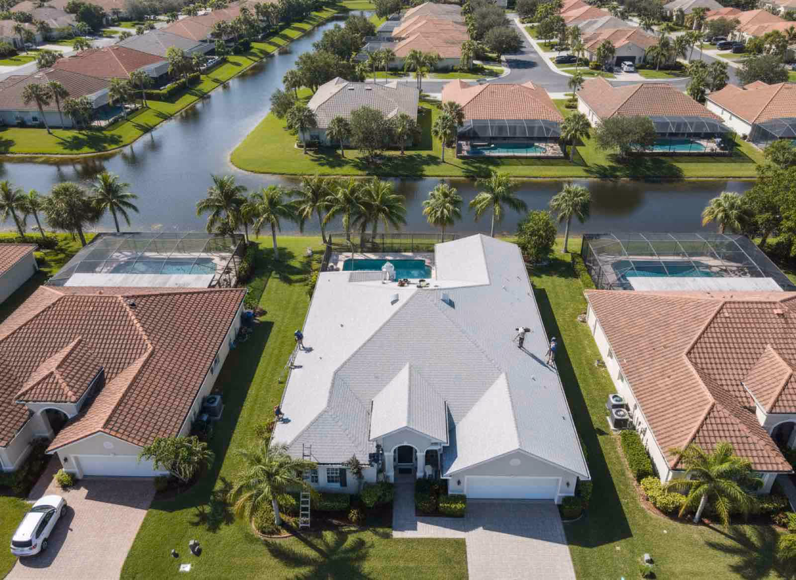Routine gutter maintenance service removing accumulated leaves before Florida storm season in Longwood