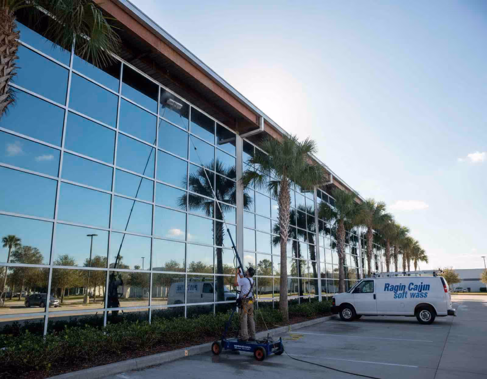 Industrial window cleaning specialist treating factory windows and industrial facility glass surfaces in Central Florida