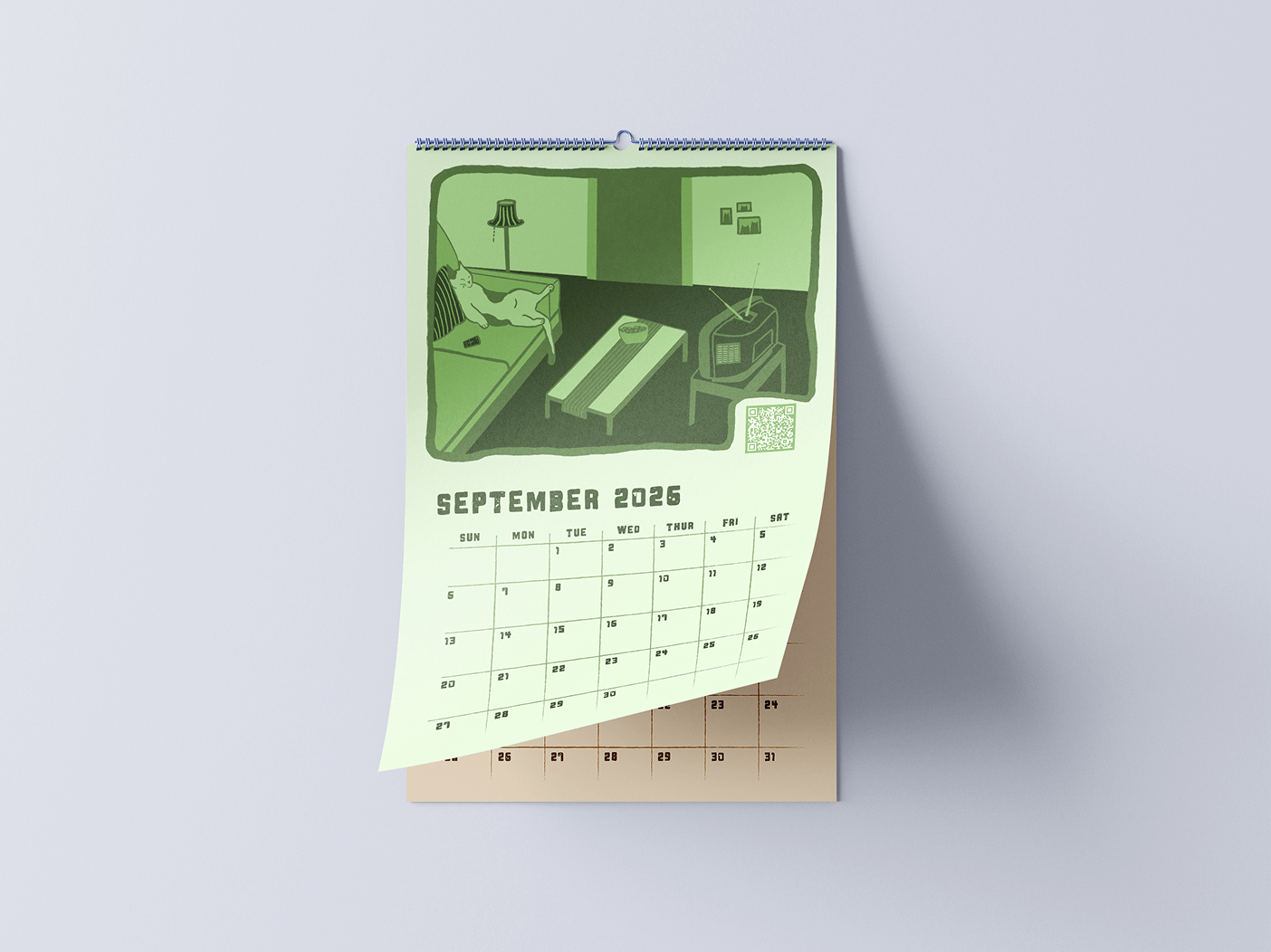 Wall calendar open to September 2026 with an illustration of a cat lounging on a sofa in a living room with a TV and coffee table.
