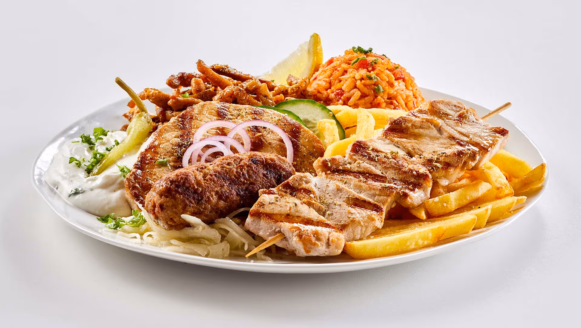 A plate of food with meat and vegetables.