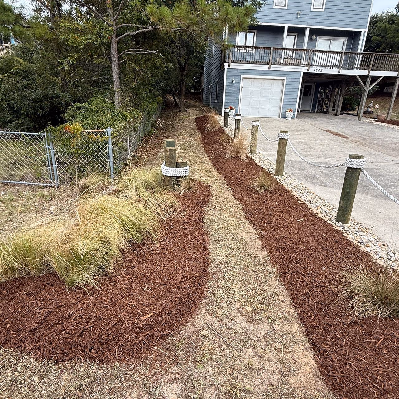 Fresh mulch installation by Yard Rescue for clean landscape beds