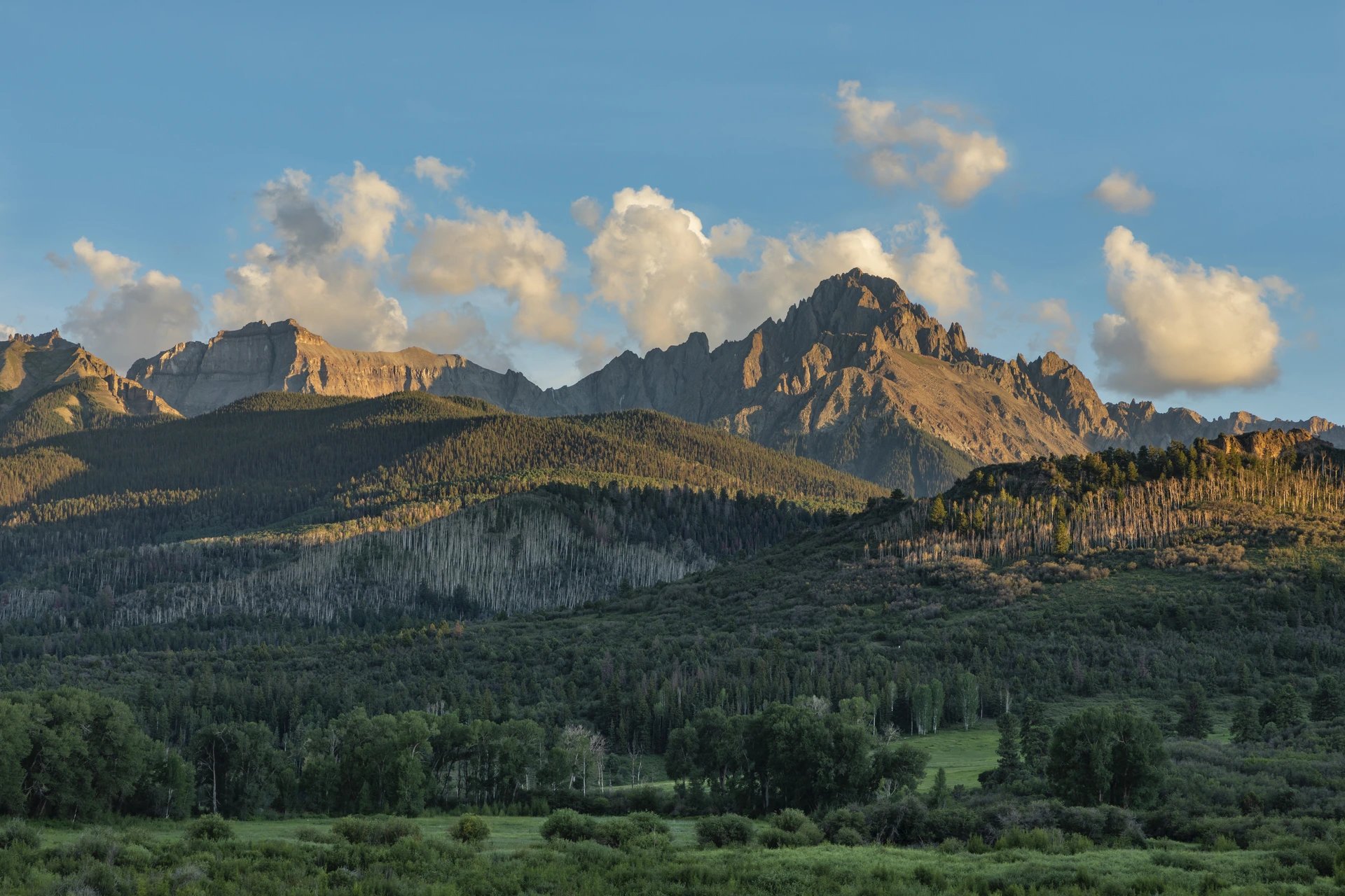 Scenic view of the San Juan Mountains near Ridgway, Colorado, at sunset — representing Lucky Services’ local roots and trusted home care for the Ridgway community.