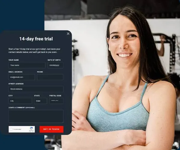 Smiling woman in a light blue tank top with crossed arms standing in a gym next to a 14-day free trial sign-up form.
