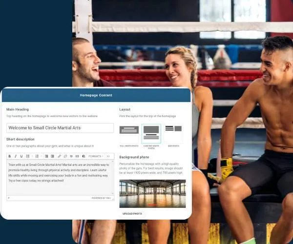 Three smiling athletes in a boxing gym sitting and talking inside a boxing ring.