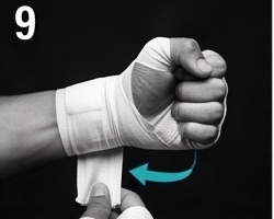 Fist clenched before fastening the Velcro