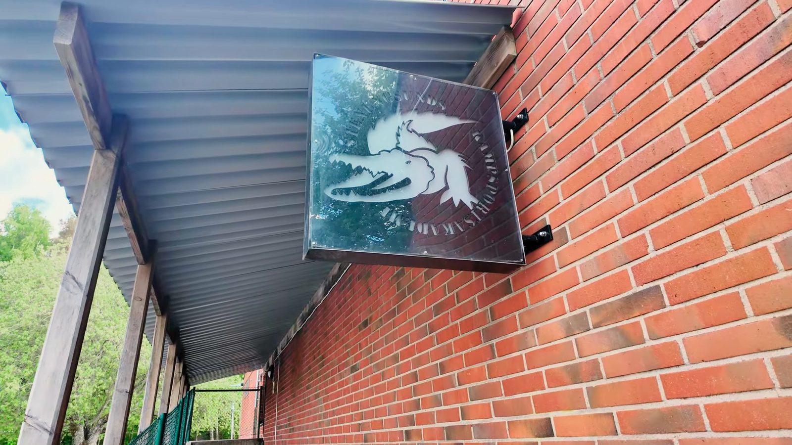 The crocodile sign over the academy entrance in Stenungsund