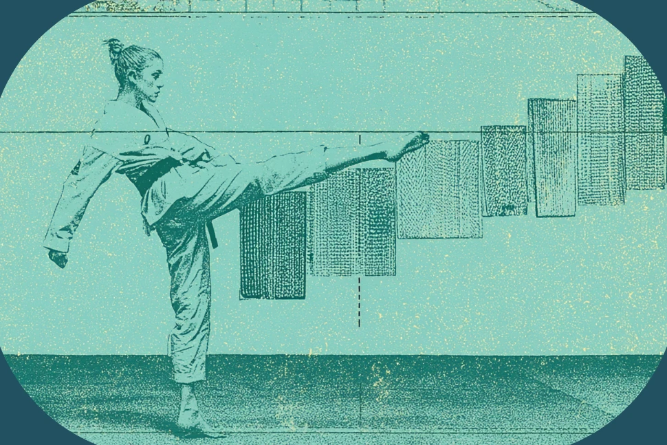 Taekwondo students in dobok practicing poomsae together in a dojang