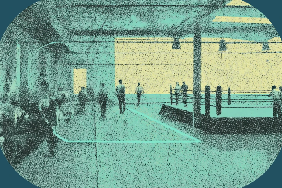 Boxing gym with heavy bags and a ring