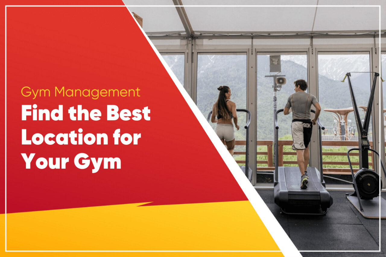 Two people running on curved treadmills facing windows with a mountain view next to a gym location title
