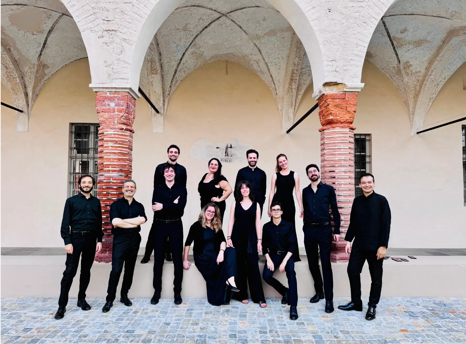 Image of Concerto Romano enseble photographed outside by a historic building