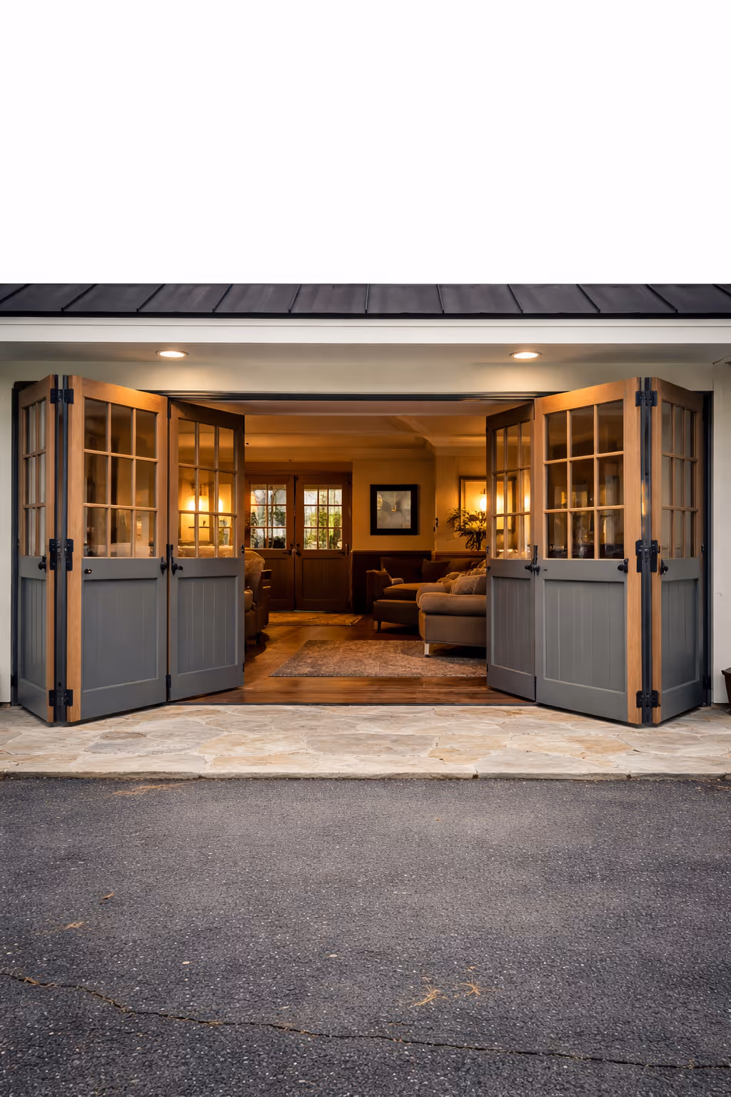 Open double wooden and glass doors revealing a cozy living room with couches, rugs, and warm lighting.
