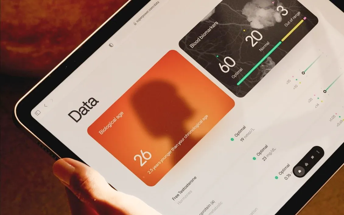 Hand holding a smartphone displaying a Thailand travel SIM card purchase screen with options for 10 days and 50 GB data at $9.90 USD.